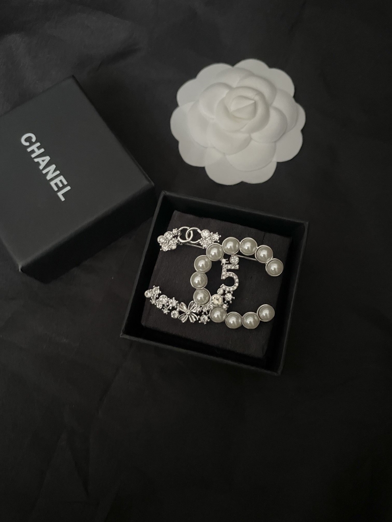 Ch**el brooches